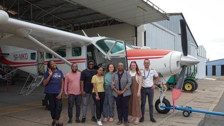 Mercy Ships Patient Selection Team with MAF pilot
