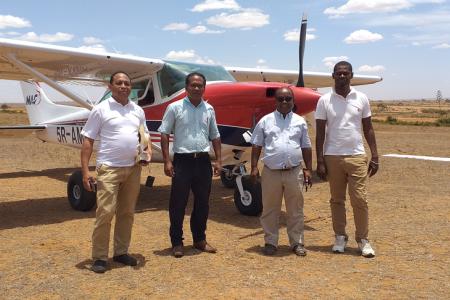 FFBBM delegation in front of MAF aircraft in Ambovombe