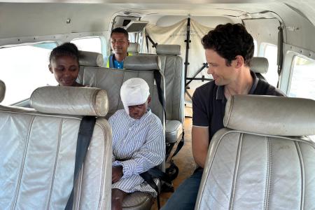 Patient Angelo BETOMBO (called Lolo) in the Plane