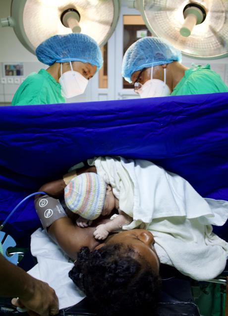 Norfinne holding Soavita, her newborn