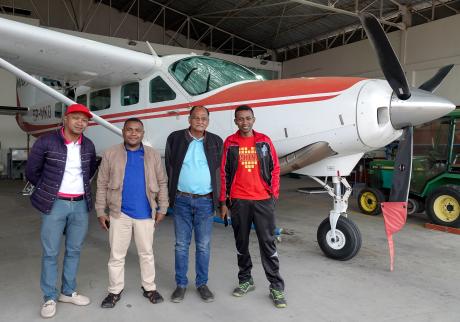 SALFA doctors near a MAF plane